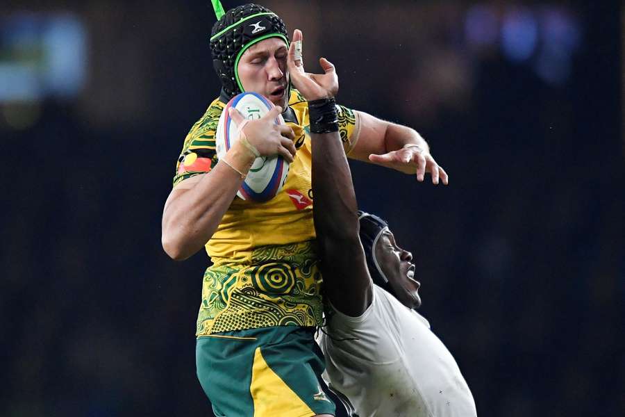 Former Wallaby Adam Coleman in action against England