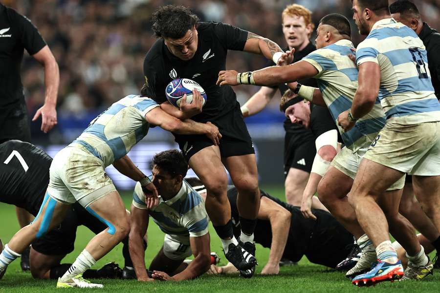 New Zealand's prop Tamaiti Williams attempts to break away