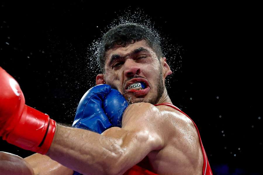 Erislandy Alvarez of Cuba in action against Jugurtha Ait Bekka of Algeria