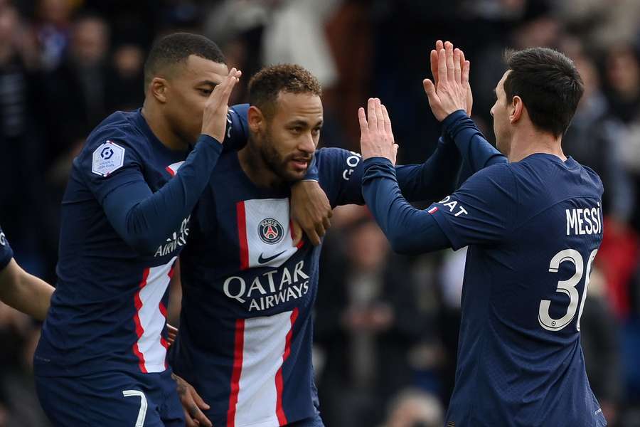 Mbappe, Neymar and Messi celebrate scoring against Lille at the weekend