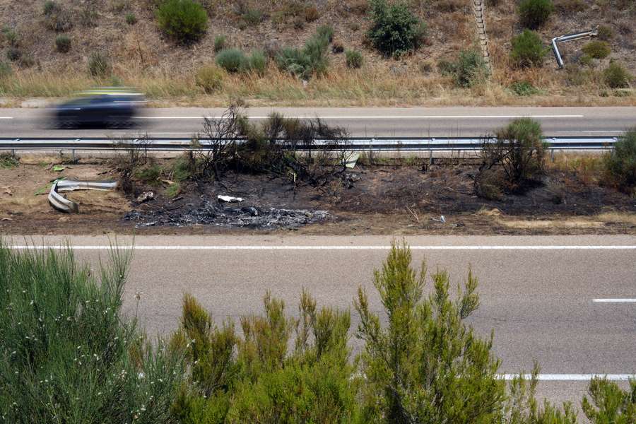 Debris and burn marks are seen along the A-52 motorway at the crash site where Liverpool sriker Diogo Jota and his brother Andre Felipe died 