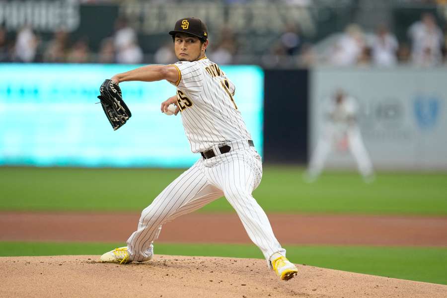 Yu Darvish throws a pitch against the Chicago Cubs during the first inning