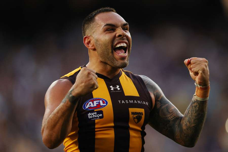 Hawthorn's Jarman Impey celebrates their unforgettable Easter Monday victory. Hawthorn's Jarman Impey celebrates their unforgettable Easter Monday victory.