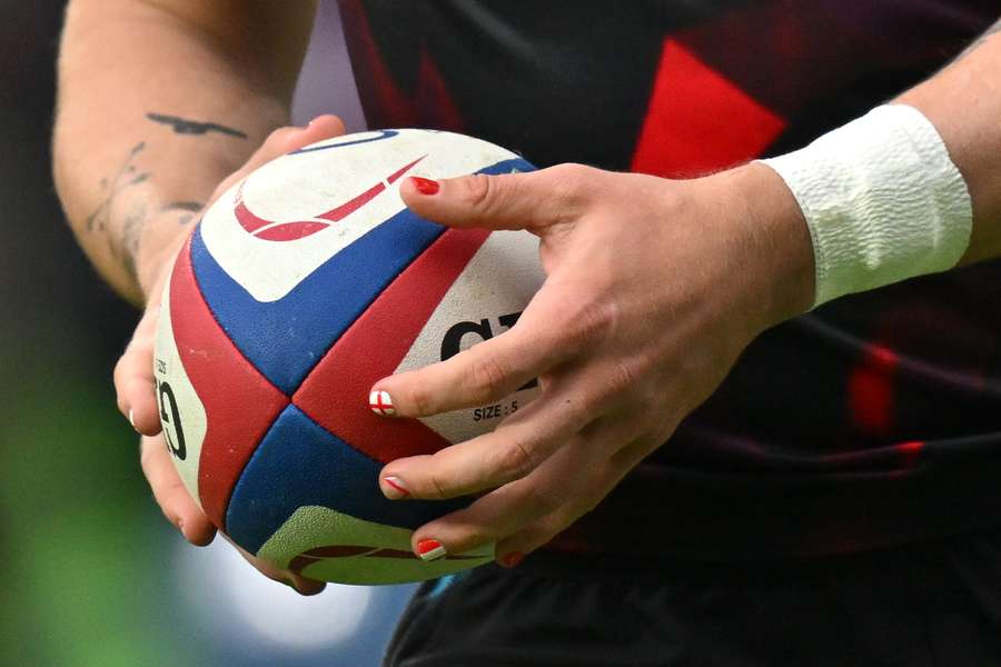 Ollie Hassell-Collins was spotted with colourful nails during England’s match with Italy Ollie Hassell-Collins was spotted with colourful nails during England’s match with Italy