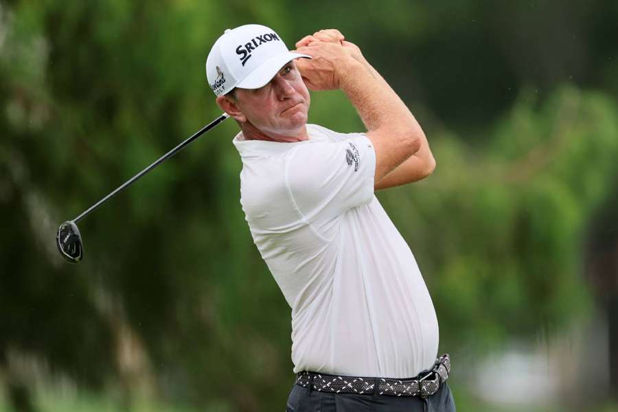Lucas Glover plays his shot from the 12th tee during the third round on Saturday