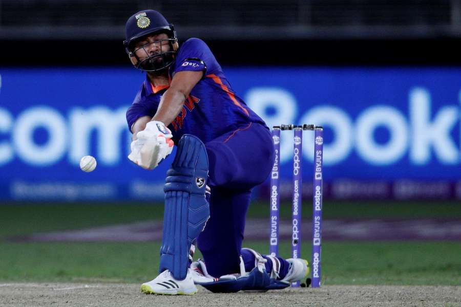 Rohit Sharma plays a sweep shot for India