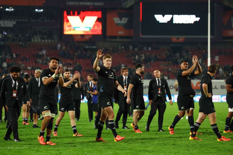 All Blacks players acknowledge their fans at Ellis Park after their 33-16 win.