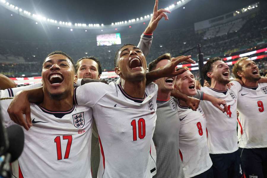 England players celebrate their 2026 FIFA World Cup win over Mexico.