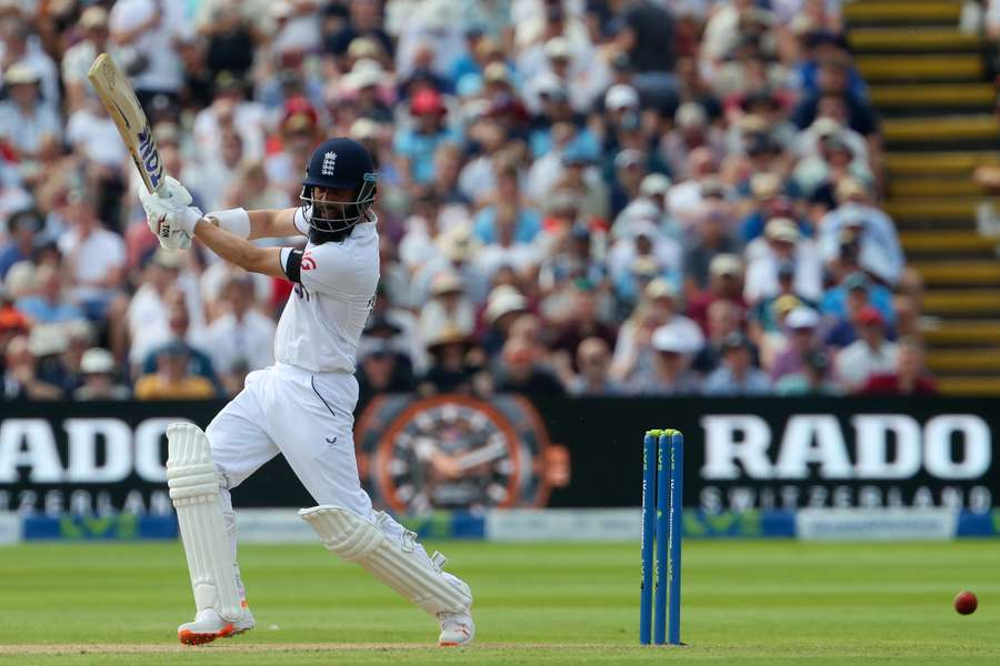 England's Moeen Ali plays a shot on the opening day