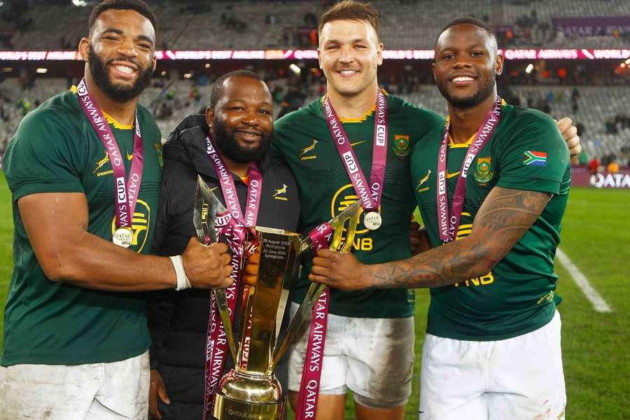 Andre Esterhuizen (second from right) poses with team-mates after the Springboks' win in Cape Town
