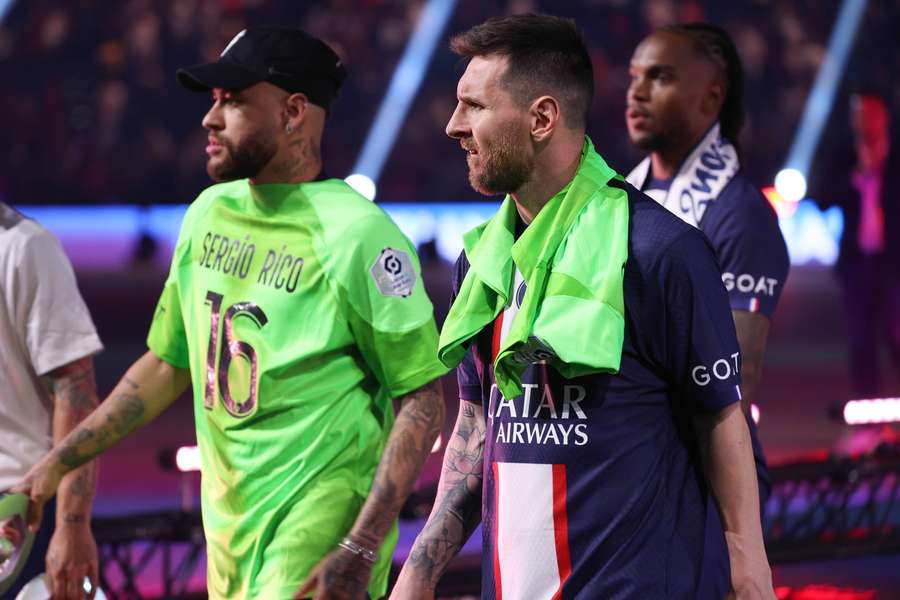 Neymar and Messi celebrate winning the Ligue 1 title