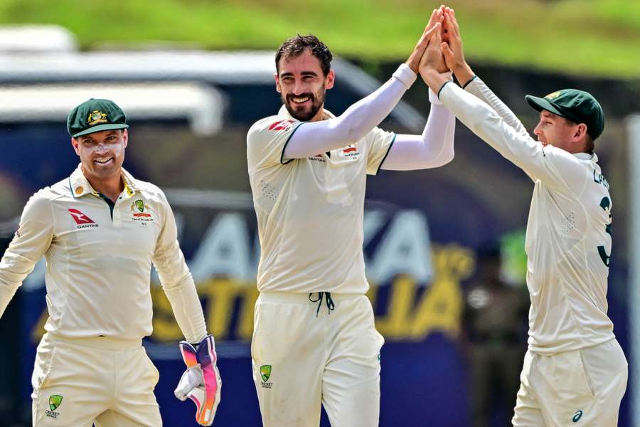 Mitchell Starc celebrates the wicket of Oshada Fernando during this year's tour of Sri Lanka. 