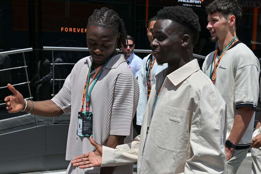 Eze alongside Saka Eze alongside Saka