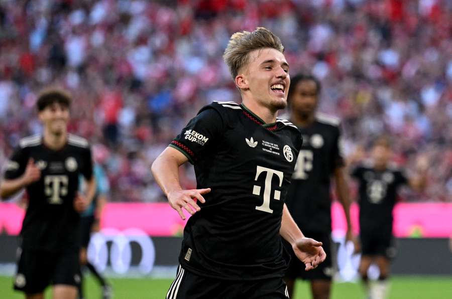 Karl celebrates his goal in pre-season against Spurs