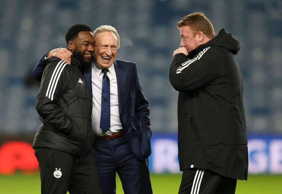 Warnock shares a laugh with Shayden Morris