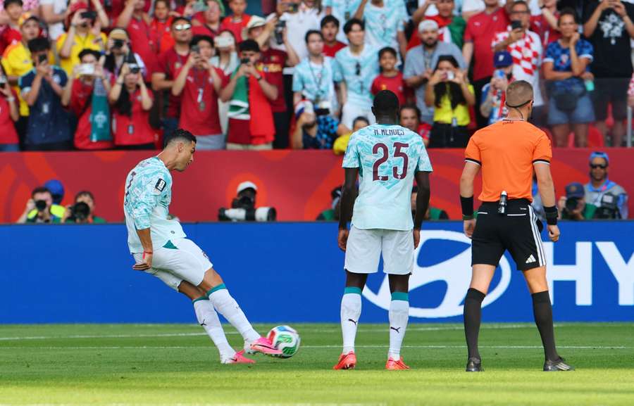 Portugal's Cristiano Ronaldo shoots at goal from a free-kick Portugal's Cristiano Ronaldo shoots at goal from a free-kick