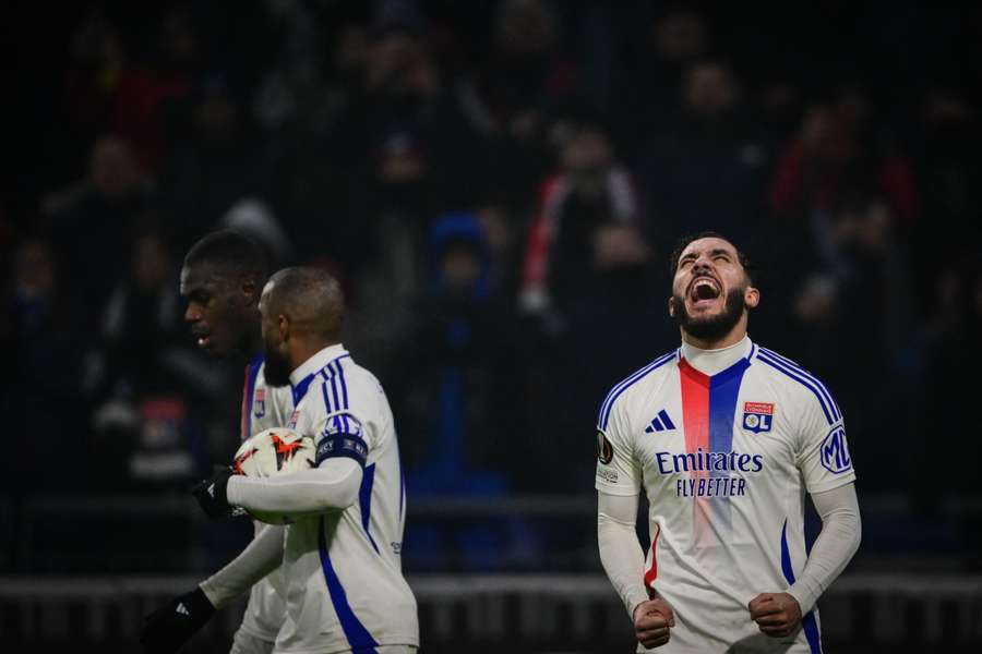 Ryan Cherki celebrates scoring