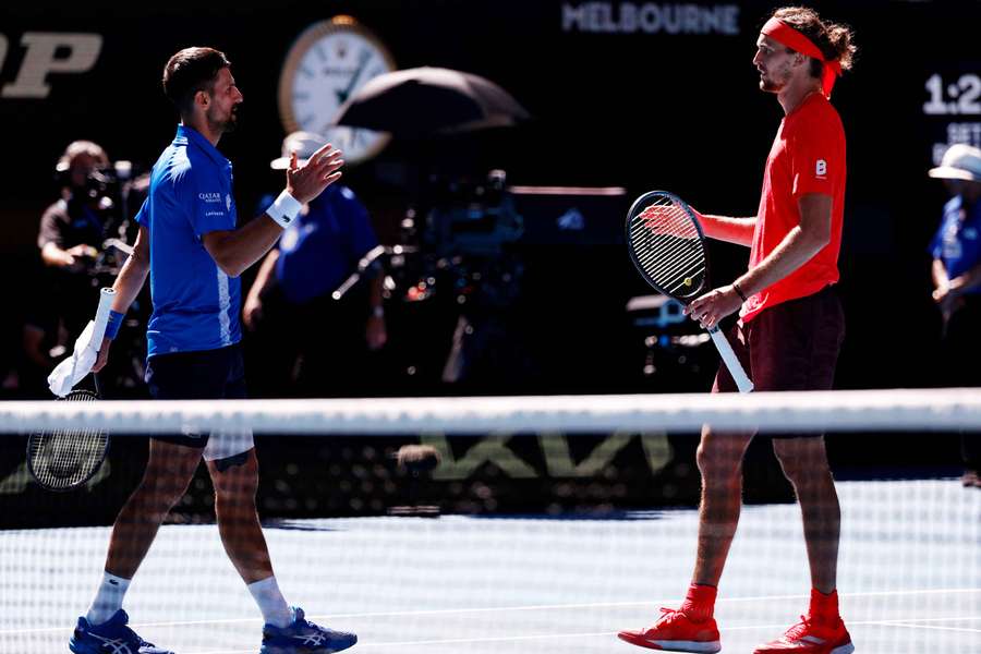 Zverev (right) has backed Djokovic to rediscover his best form
