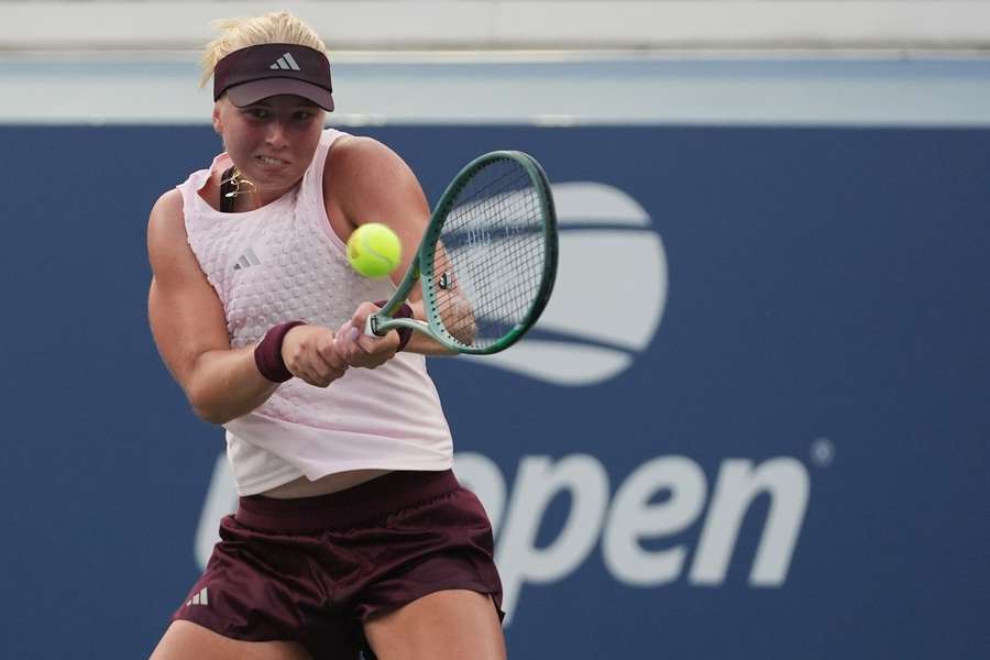 Clara Tauson in action against Sloane Stephens in the first round of the US Open