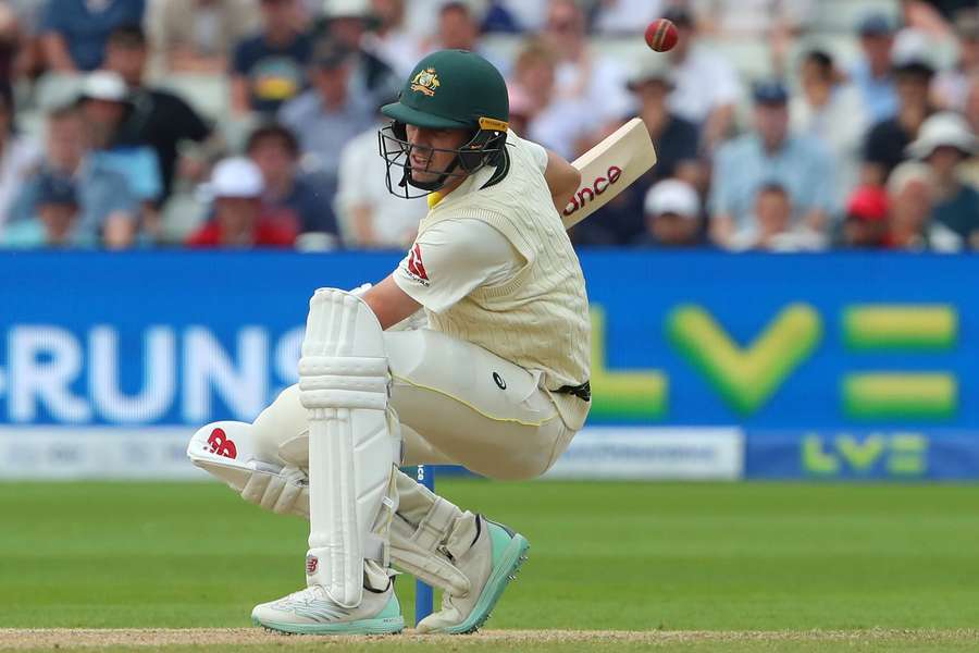 Australia's Pat Cummins ducks a high ball on day five of the first Ashes cricket Test match between England and Australia