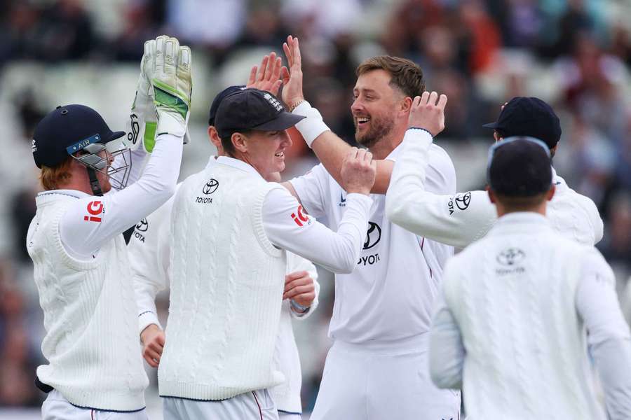 England's players celebrate against Pakistan