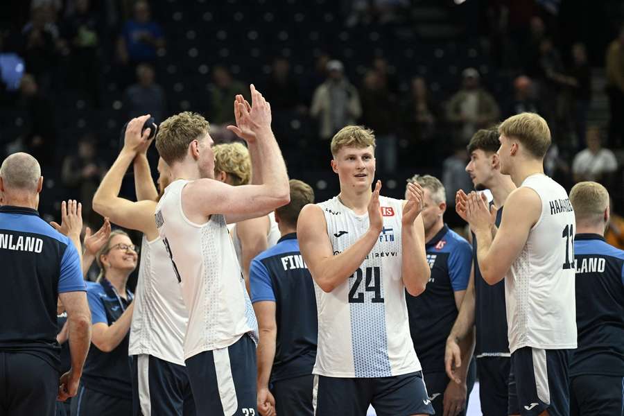 Finland celebrate their win against the Netherlands