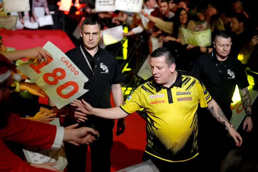 Dave Chisnall booked his place in the third round after beating Andew Gilding