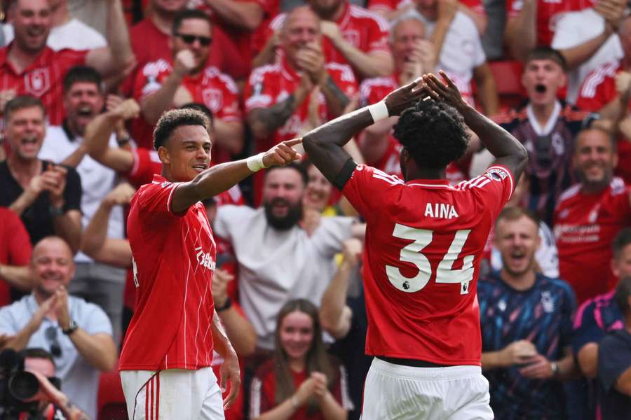 Dan Ndoye celebrates scoring for Nottingham Forest alongside Ola Aina