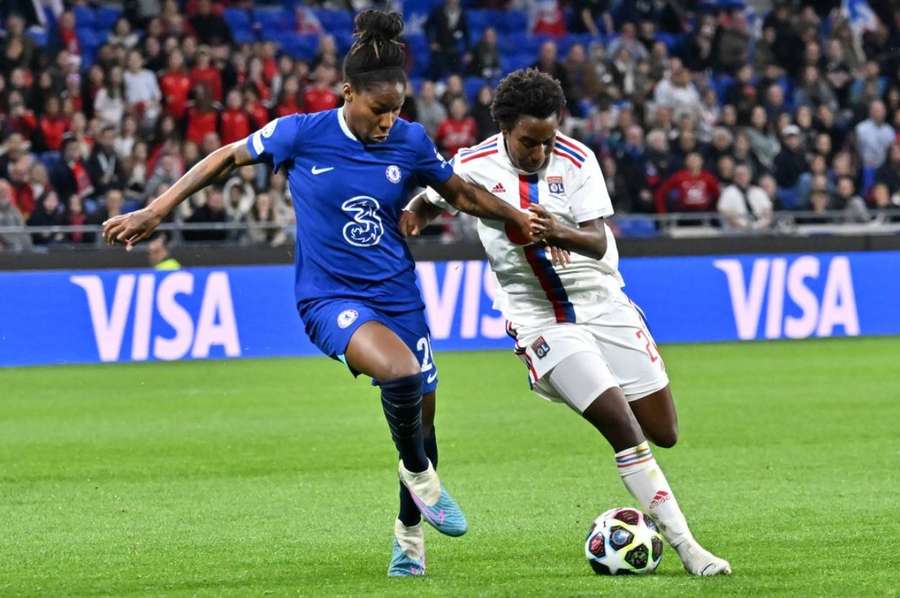 Chelsea's Kadeisha Buchanan vies for the ball with Lyon's Vicki Becho