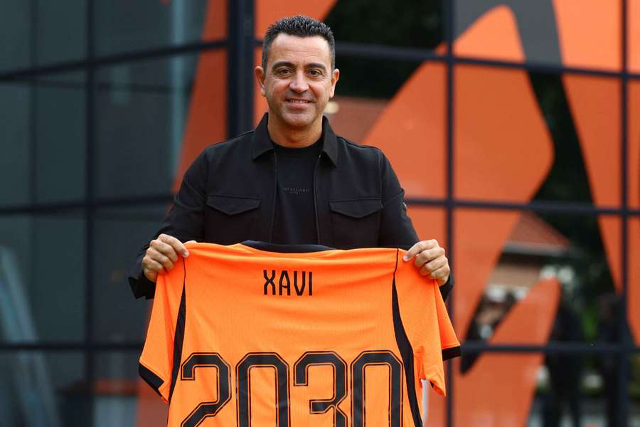 Netherlands coach Xavi Hernandez poses with the kit at his unveiling Netherlands coach Xavi Hernandez poses with the kit at his unveiling