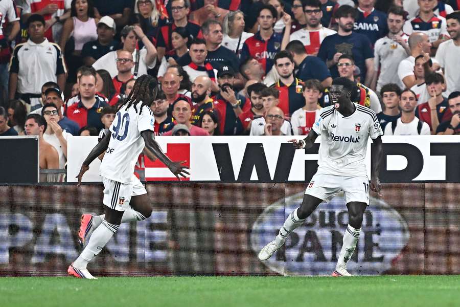 Assane Diao of Como celebrates scoring his team’s fourth goal with Moise Kean