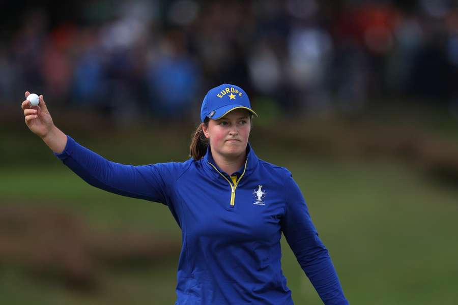 Lottie Woad rolled in the winning putt for Team Europe Lottie Woad rolled in the winning putt for Team Europe