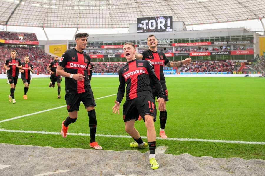 Wirtz (c) and Xhaka (r) are set to stay at Leverkusen