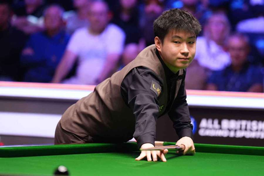 Zhao Xintong during his match with Zhang Anda