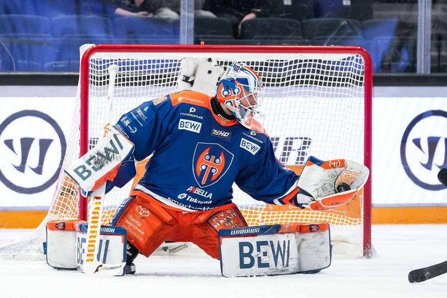 Christian Heljanko makes one of his 26 saves