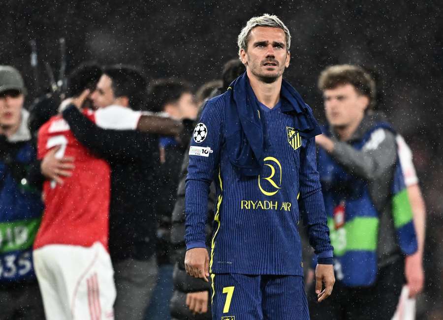 Atletico Madrid's Antoine Griezmann looks dejected after the match