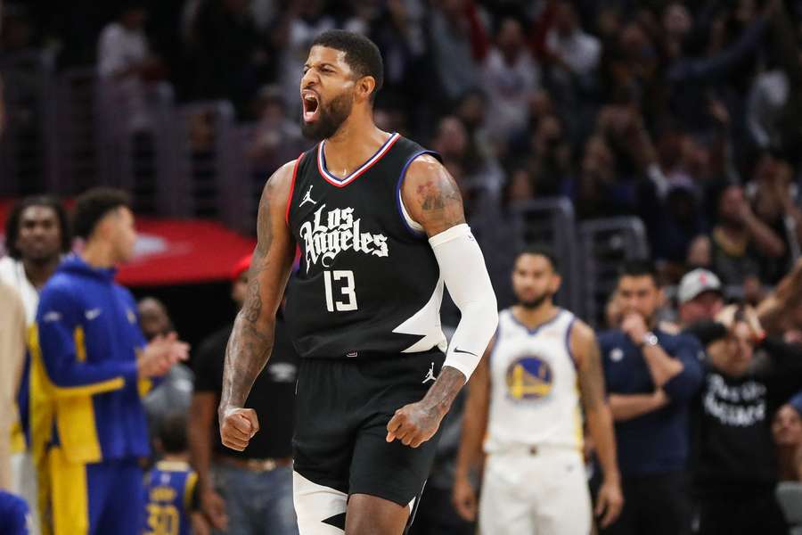 Paul George of the LA Clippers reacts to his game-winning three-pointer in an NBA victory over the Golden State Warriors
