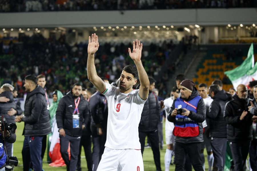 Taremi celebrates after the result
