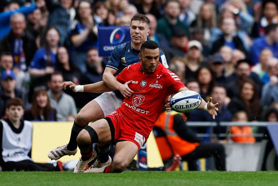 Toulouse's Matthis Lebel in action with Leinster's Jordan Larmour