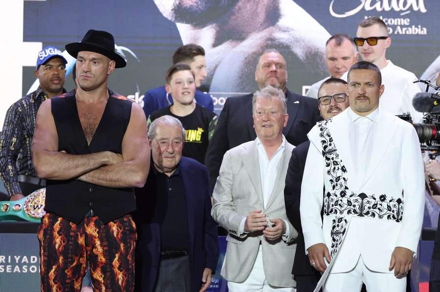 British boxer Tyson Fury (L) and Oleksandr Usyk (R) of Ukraine pose after attending a press conference in Riyadh, Saudi Arabia