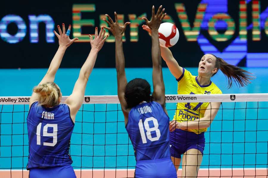 Anna Haak (right) of Sweden attempts to score
