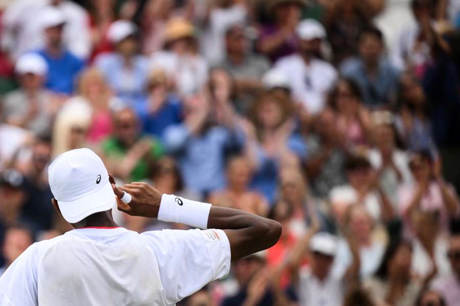 Christopher Eubanks reacts as he plays against Stefanos Tsitsipas