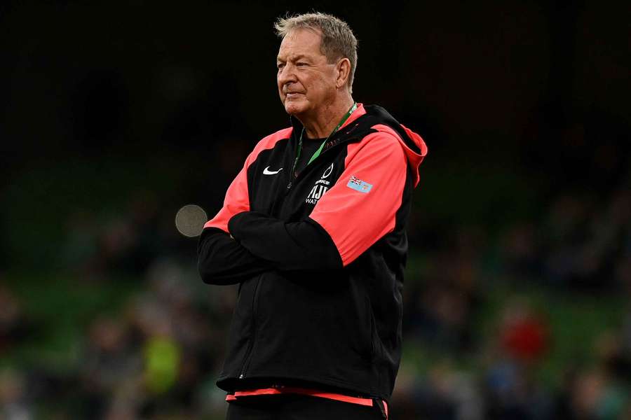Fiji head coach Mick Byrne looks on as his team warms up. Fiji head coach Mick Byrne looks on as his team warms up.