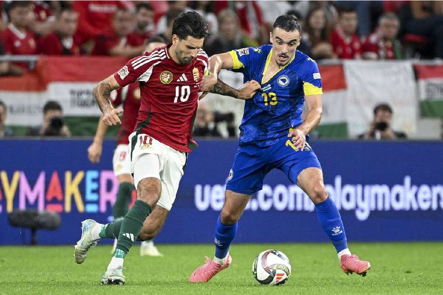 Dominik Szoboszlai of Hungary and Ivan Basic of Bosnia and Herzegovina in action