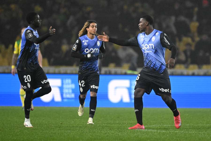 Kassoum Ouattara, Saimon Bouabre and Breel Embolo celebrate Monaco's second goal against Nantes