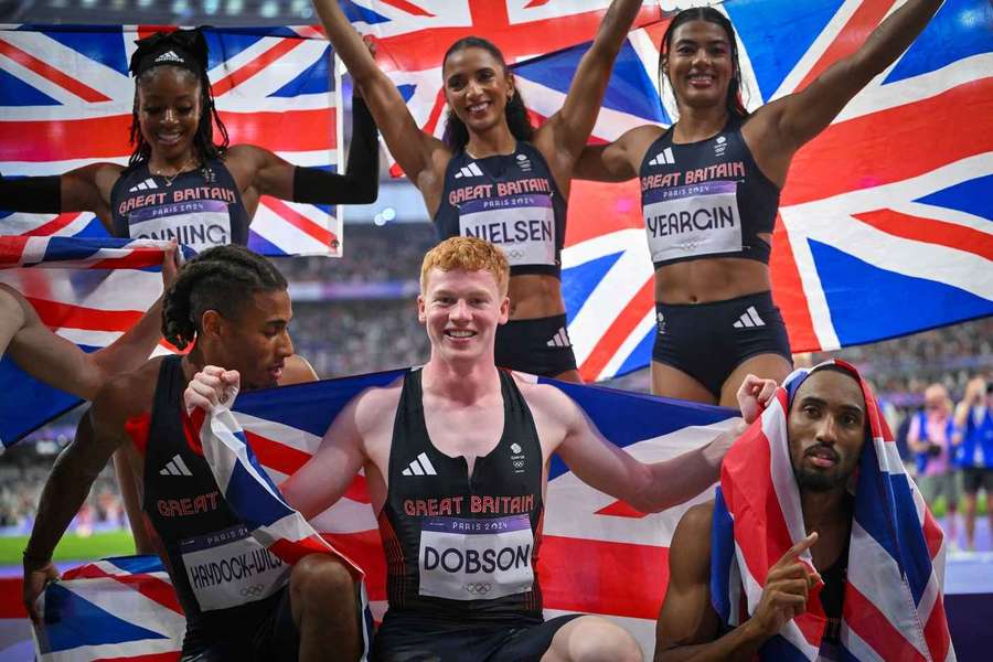 Great Britain's Charles Dobson (middle) celebrates as both the men and the women take bronze