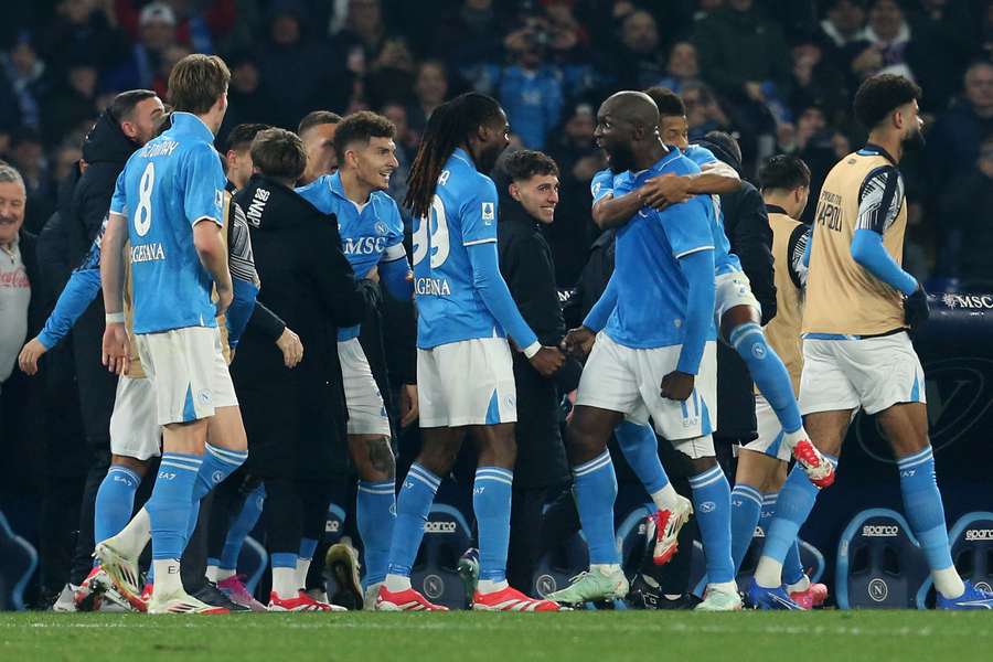 Napoli players celebrate Romelu Lukaku's winning goal