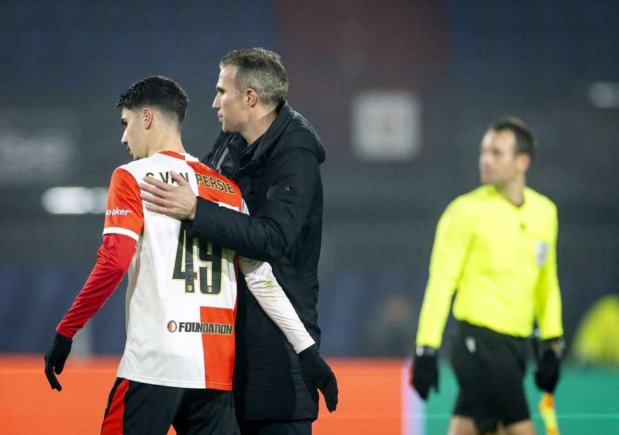Feyenoord's Shaqueel van Persie (L) with father and manager Robin van Persie