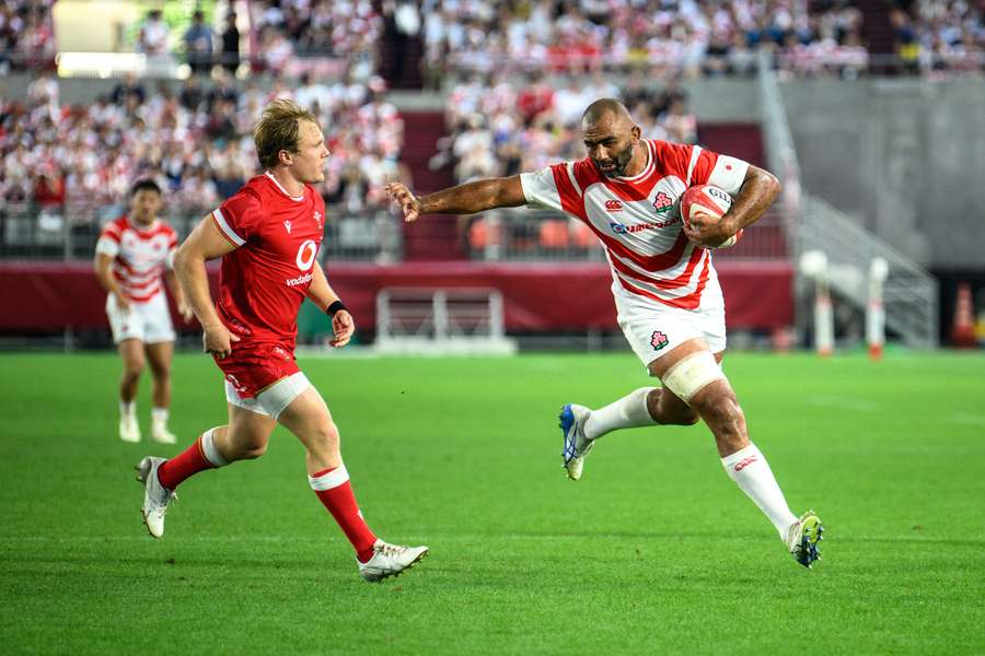 Michael Leitch runs with the ball during Japan's mid-year international against Wales.