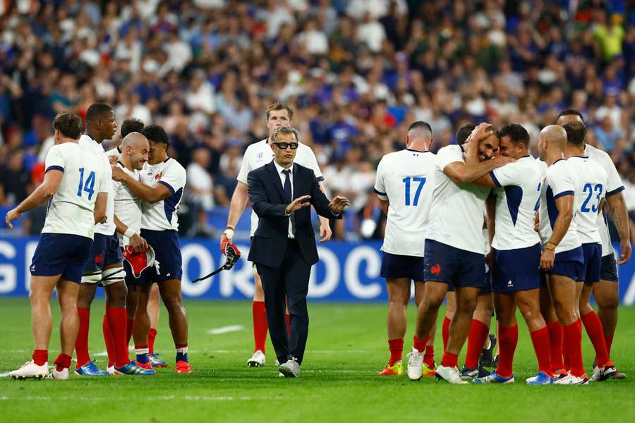 Fabien Galthie congratulates his team after their victory